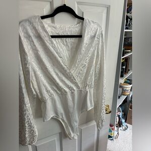 White animal print body suit